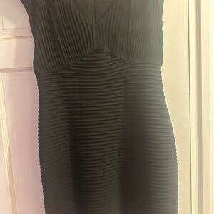 Never worn black dress by Calvin Klein. Size 14
